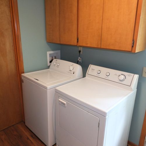 Laundry room:  convenient main floor laundry area with a washer and dryer.