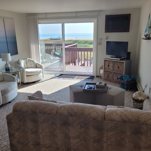 Overview: the very cute living room with a great view of lake huron!