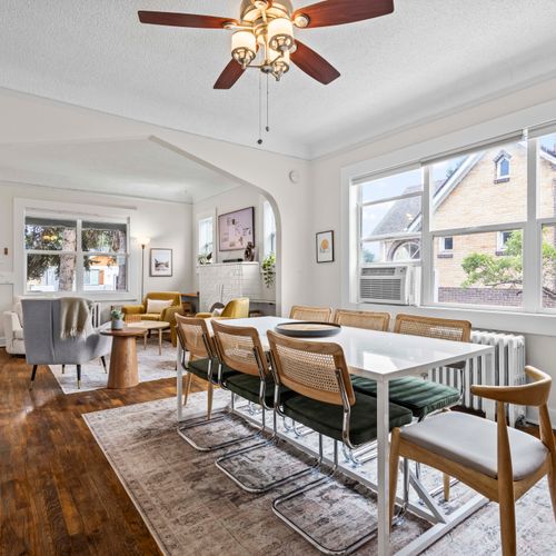 Sunlit table invites family-style dinners and cheerful morning breakfasts together.