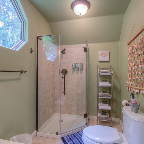 Full custom shower in the bunkhouse with plenty of towels and amenites