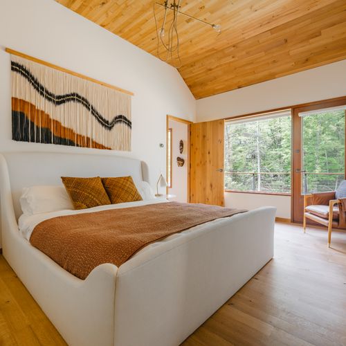 master bedroom on the first floor with ensuite bathroom and balcony