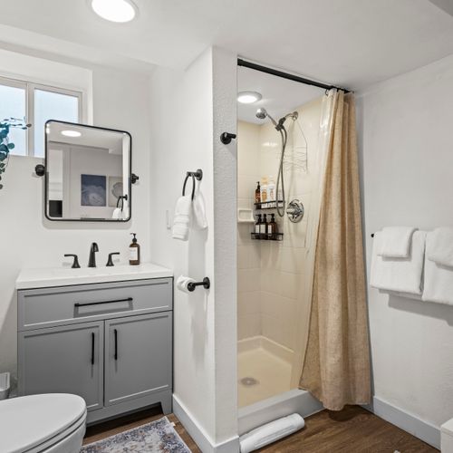 Spa-inspired bathroom with clean finishes and a refreshing walk-in shower.