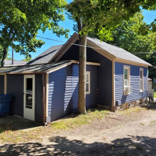 EXTERIOR:  The side and back of the house.