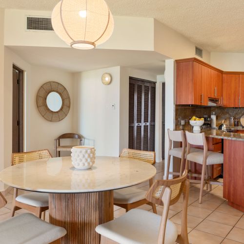 A harmonious blend of form and function, this area is ideal for sharing meals and making lasting memories.