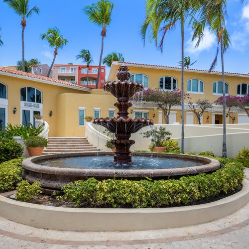 Be captivated by the vibrant colors and soothing sounds of our outdoor fountain.