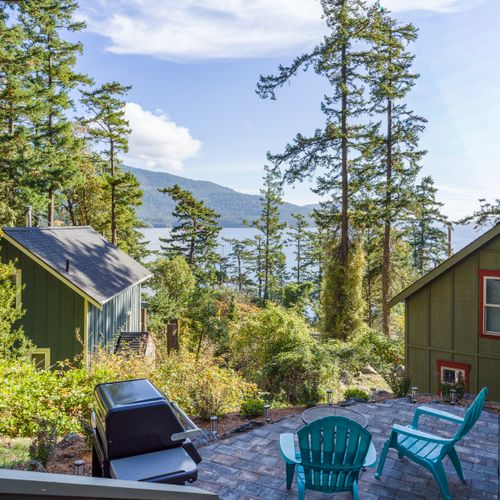 Our favorite place to sit back with a coffee and listen to the trees and ocean below.