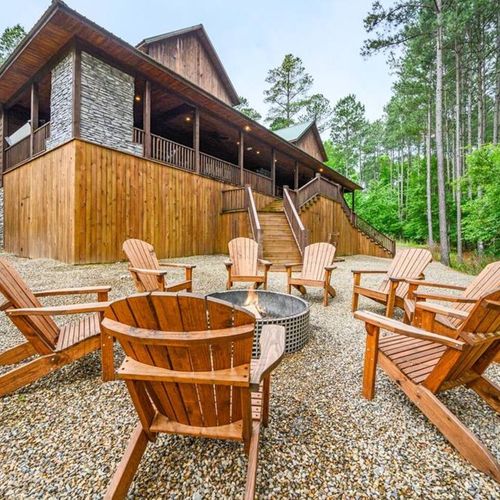 The firepit sits outside the cabin and is perfect spot for s'mores!