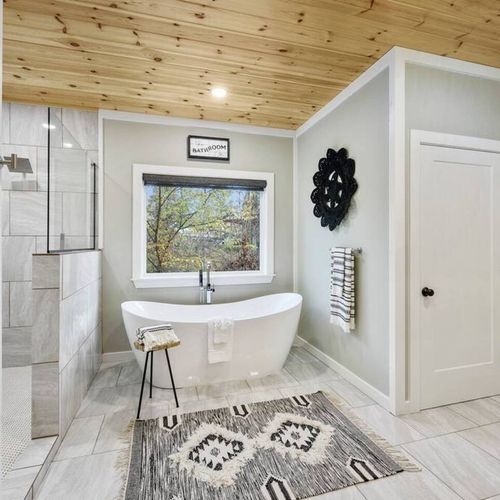 The private bath features an oversized soaking tub!