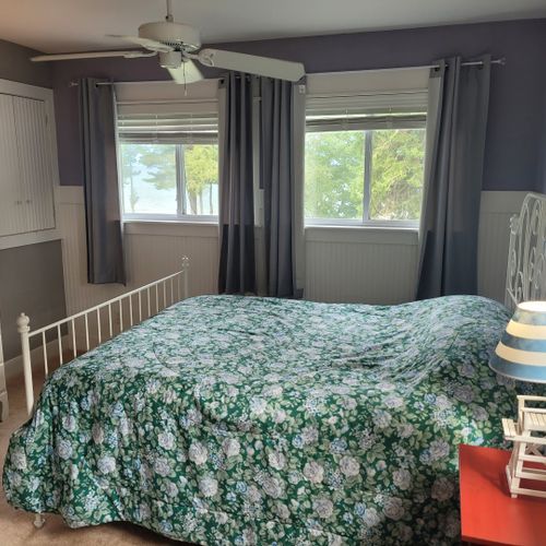 Bedroom #3 (larger house, second floor):  features a queen-size bed, dresser, closet, and great views of lake huron!