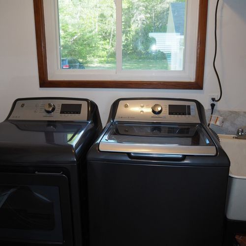 Laundry room:  the home has a very convenient main floor laundry room with a washer, dryer, and laundry sink.