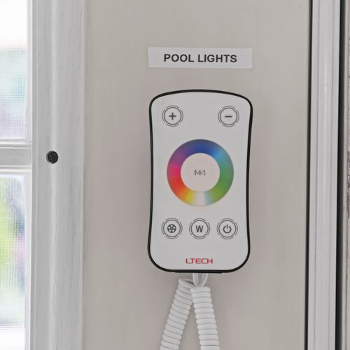Customize the pool lighting for the perfect vibe.