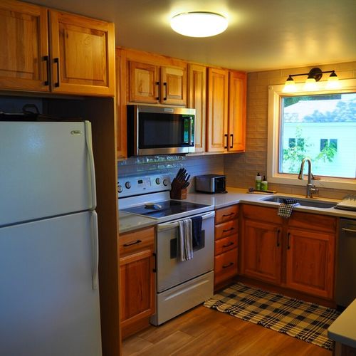 Kitchen:  the cottage has a newly-remodeled kitchen with all modern appliances, including a dishwasher and a little coffee bar. There is also a good supply of cooking and dining utensils provided.