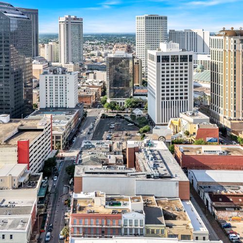 Bird's-eye view of the New Orleans skyline stretching into the horizon.