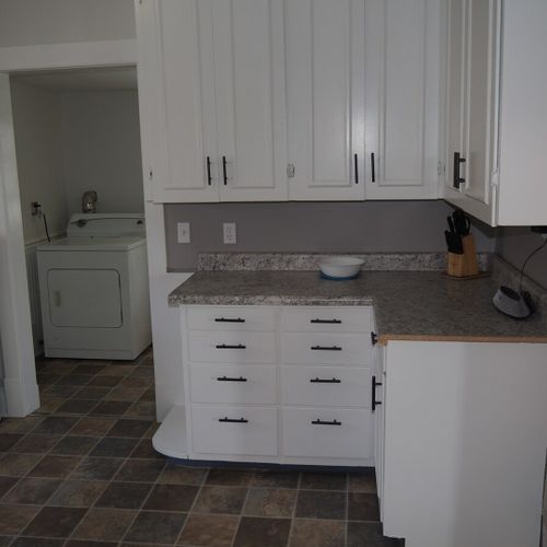 Kitchen:  the home has a huge kitchen that is complete with all modern appliances, including a dishwasher. A good supply of cooking and dining utensils are included as well.