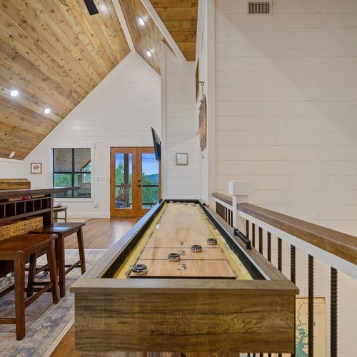 Shuffleboard, games and a private balcony!