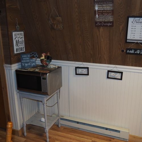Kitchen:  full kitchen including sink, counter, cabinets, refrigerator, electric range and a good supply of cooking and dining utensils.