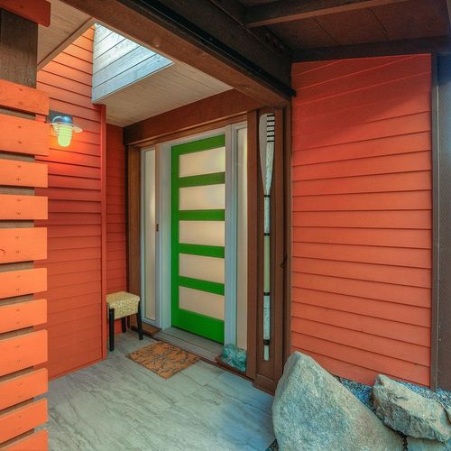 Front entrance with privacy barn door.