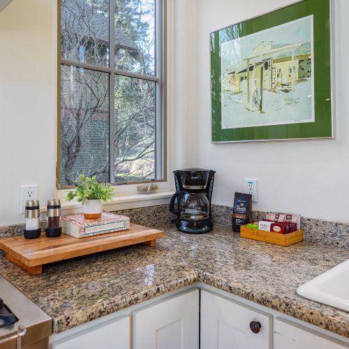 Start your morning with complimentary coffee and tea at this thoughtfully arranged beverage station.