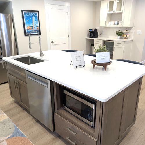 KITCHEN:  The home has a big and beautiful kitchen with all appliances including a dish washer, coffee bar, food pantry, and separate beverage cooler