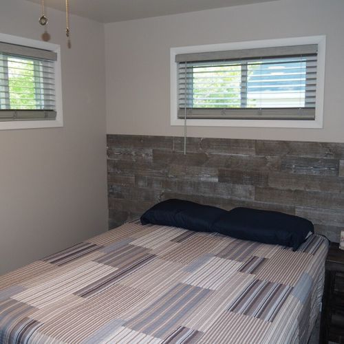 Bedroom #2:  also features a queen-size bed, ceiling fan, and closet.