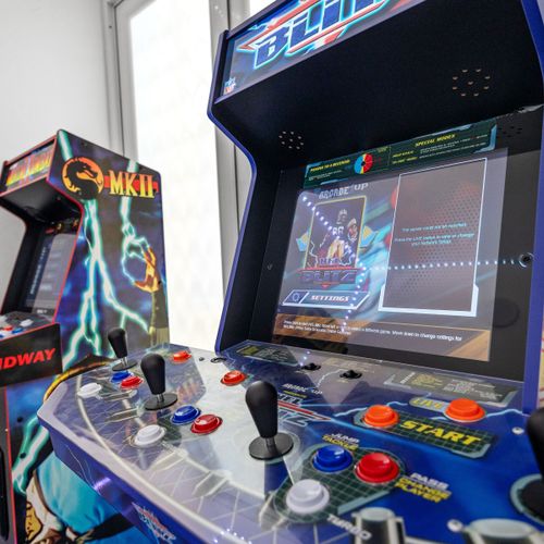 Experience the perfect blend of retro gaming and contemporary design, where every corner invites you to play and relax.