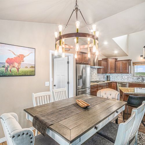 A warm, well-lit area made for easy meals and good company.