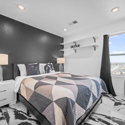 Another view of the bedroom, offering space to unwind and rest.