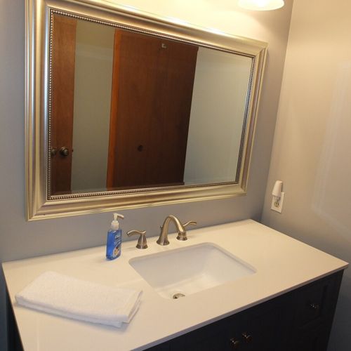 Bathroom #1:  full bathroom with a combination tub and shower.