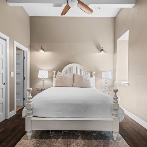 Calming hues in the second bedroom set the stage for rest.