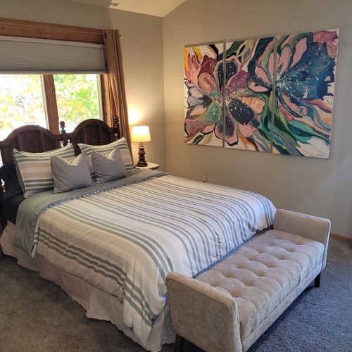 BEDROOM #2 (SECOND FLOOR):  Features a queen-size bed, closet, mirror, and private live-streaming television.