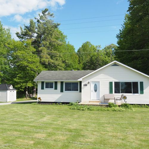 Overall:  the front of the home in summer.