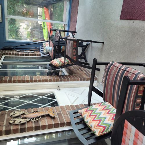 Sunroom:  the lovely sunroom with a great view of the lake! Perfect for morning coffee or evening wine!