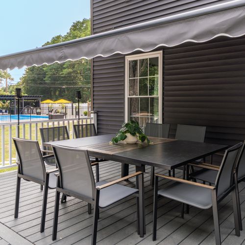 A retractable awning for eating al fresco.