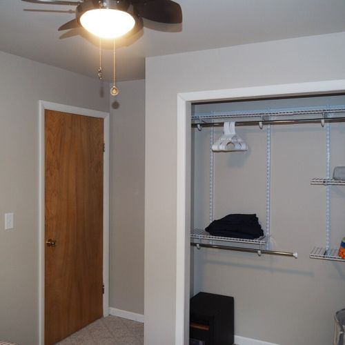 Bedroom #2:  also features a queen-size bed, ceiling fan, and closet.