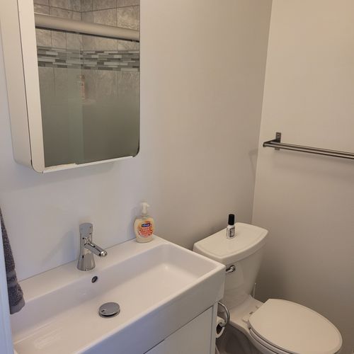 Bathroom #1:  private en suite full bathroom for bedroom #1 with a walk-in shower.