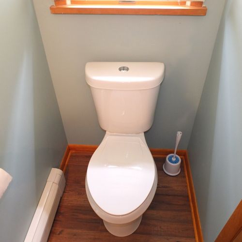 Bathroom #2:  half-bath a wink, mirror, and toilet.