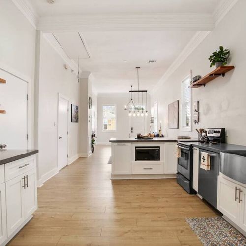Fully stocked kitchen w/ stainless appliances & plenty of counter space to cook & entertain.