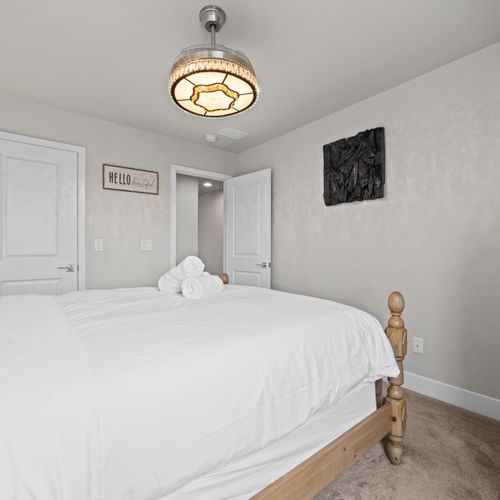 Fresh, spotless bedroom designed for total relaxation.