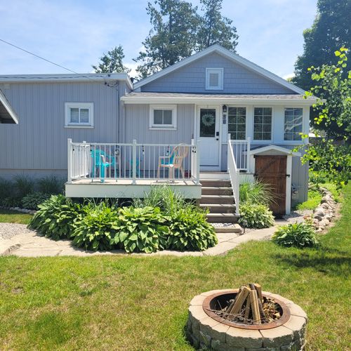 OVERVIEW:  The beautiful backyard deck and bonfire ring in the summer.