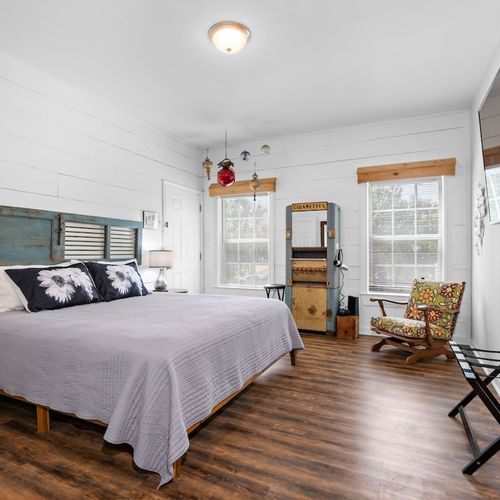 Kind Size Bed in bedroom #2 of the main house with a dressing station