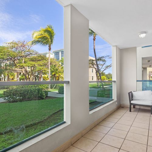 Enjoy a large porch with the view of the pool and nature.