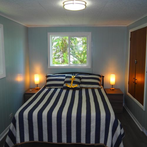 Bedroom #2 (second floor):  large upstairs bedroom with queen-size and twin bed.