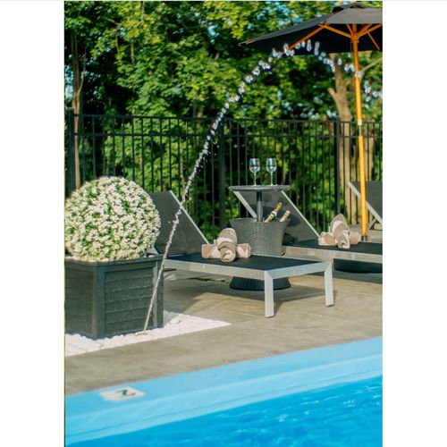 These unique poolside coolers double as a table top, perfect for resting your glass and chilling your champagne.