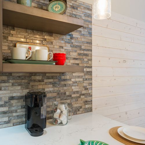 Thoughtfully curated details elevate even the simplest moments; wake up to a beautifully stocked coffee nook ready for you.