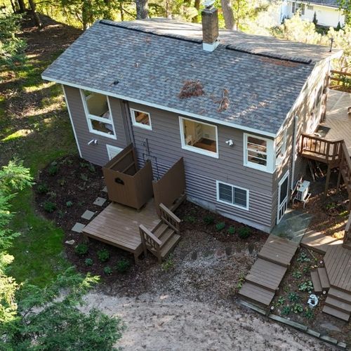 OVERVIEW:  Aerial photo of the entire cottage from the front.