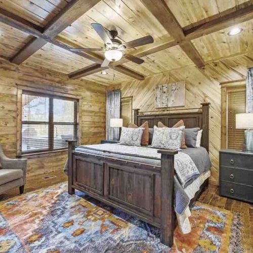 Downstairs Master Suite 3 with views to the outdoor entertainment area.