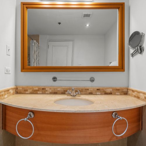 Rejuvenate in this inviting bathroom, complete with a bathtub and separate shower. Getting ready is a breeze.