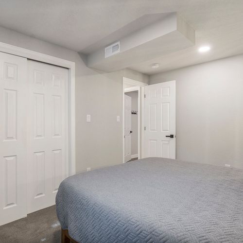 Each room features ample clothing storage with well-organized closets, ensuring you have plenty of space for all your belongings during your stay.