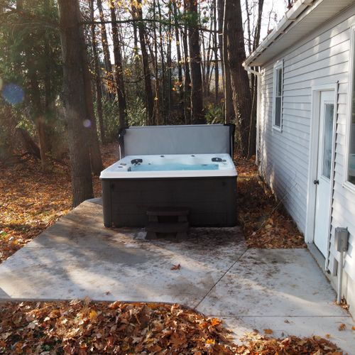 Exterior:  the new year-round hot tub in the backyard.