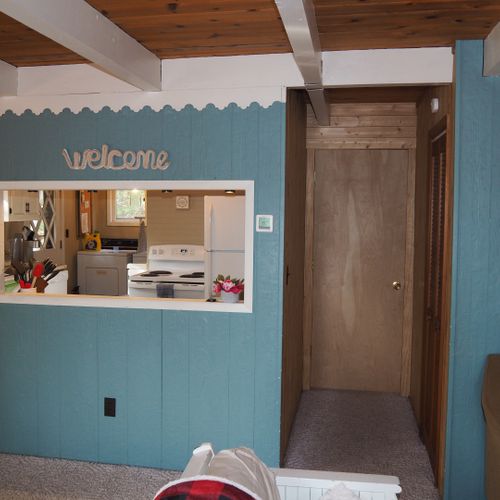Bedroom 1 (main floor):  the entrance to the main floor bedroom is to the right of the kitchen.